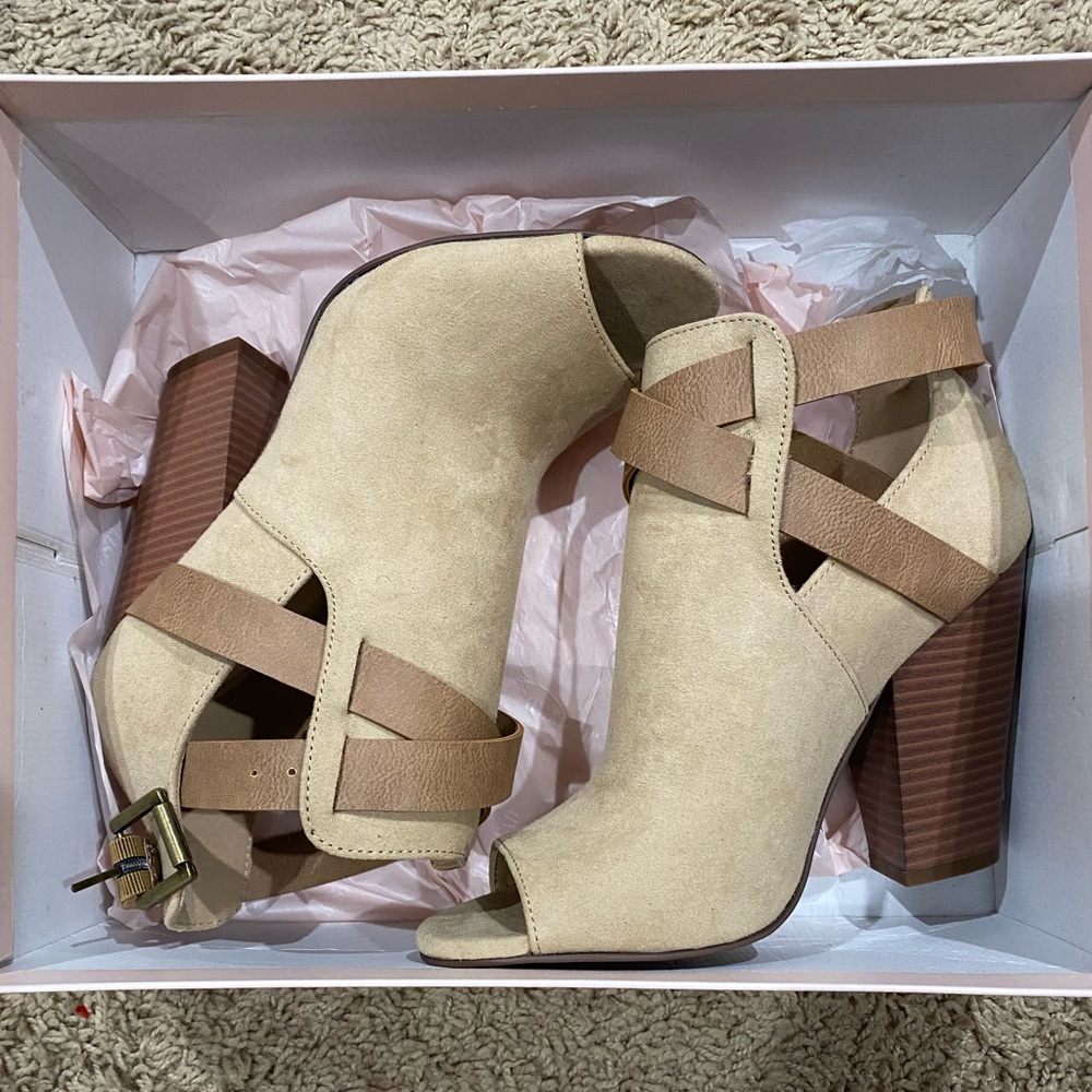 Tan booties with brown strap. JustFab